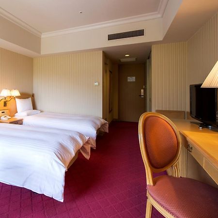 Hotel Okura Jr Huis Ten Bosch Sasebo Bagian luar foto A room at the hotel