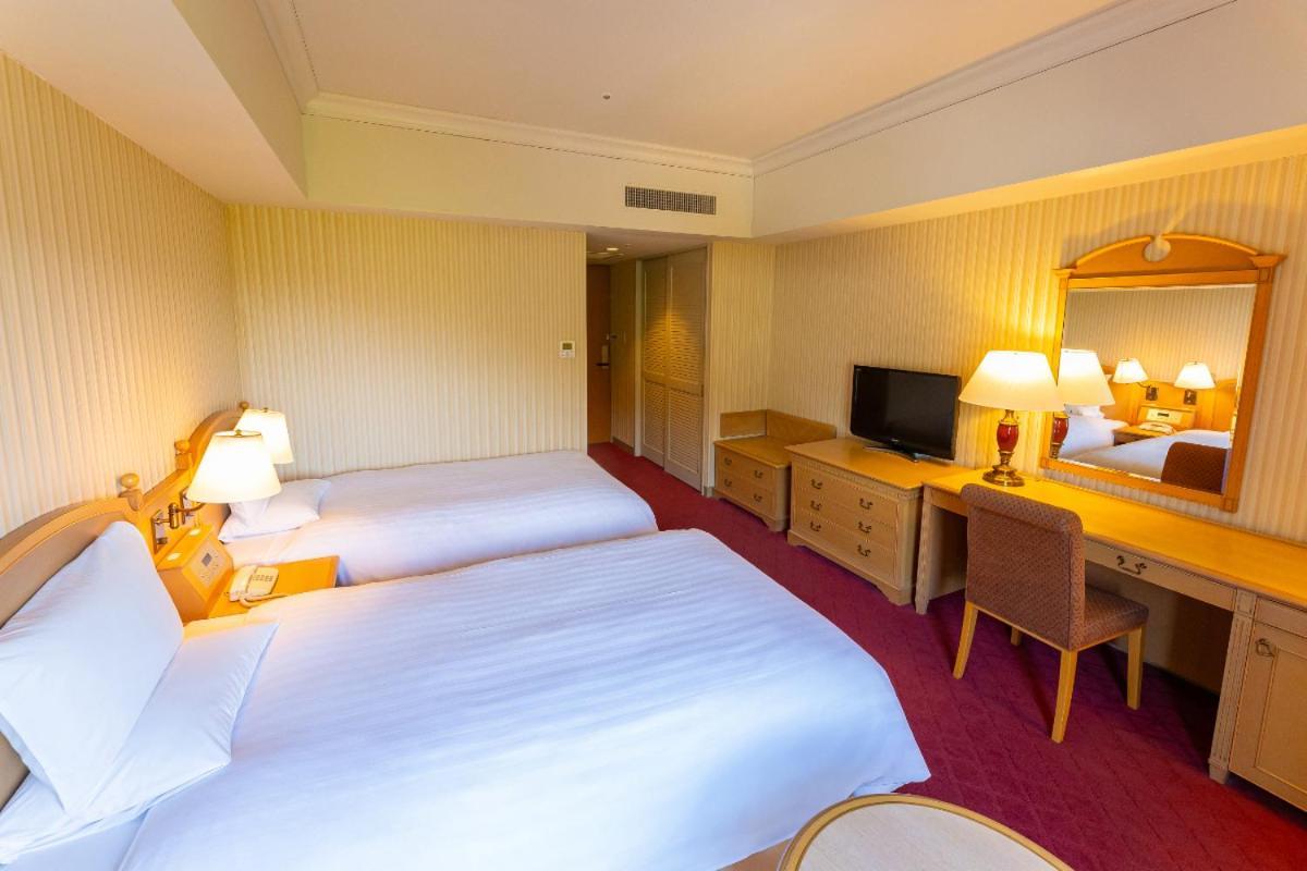 Hotel Okura Jr Huis Ten Bosch Sasebo Bagian luar foto A room at the hotel